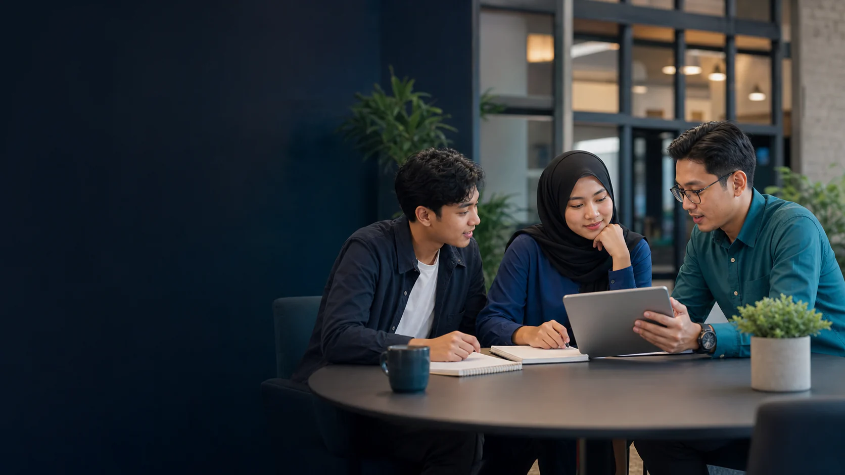 Malaysian TVET students discussing their study plans with a college advisor